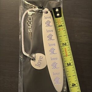 New Silver Love Bookmark‎ with purple letters and pink string